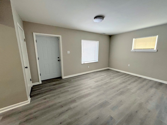 spare room featuring hardwood / wood-style floors