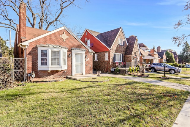 view of front of property with a front lawn