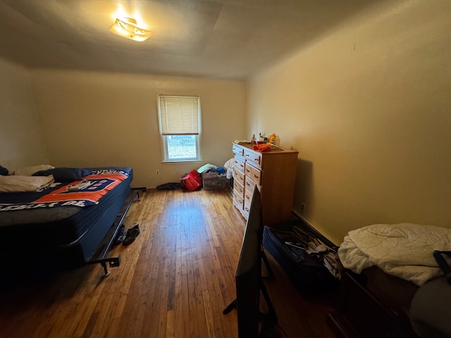 bedroom featuring hardwood / wood-style floors