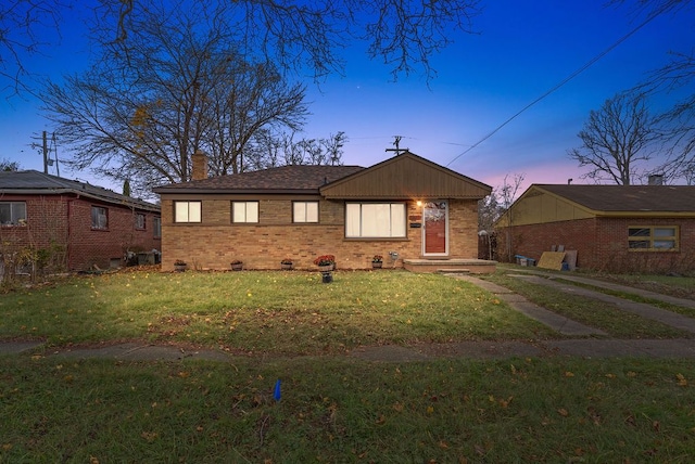 view of front of house with a lawn