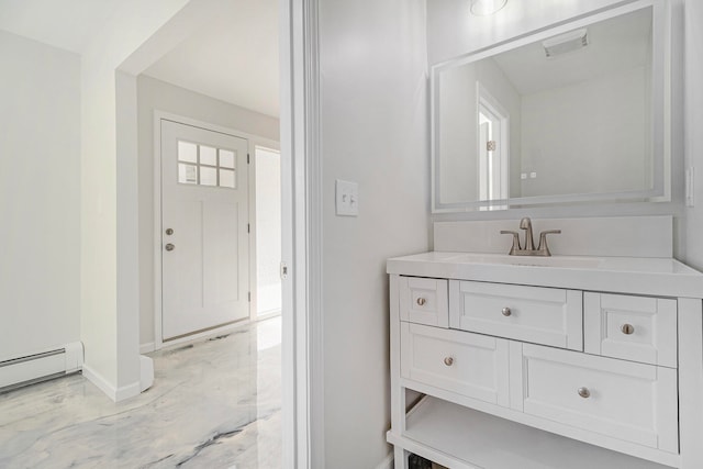 bathroom featuring vanity and a baseboard radiator