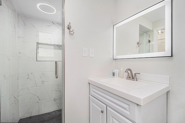 bathroom with vanity and walk in shower