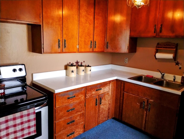 kitchen featuring sink and range with electric cooktop