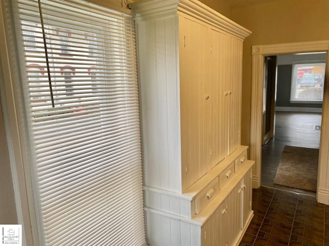 mudroom with dark hardwood / wood-style floors