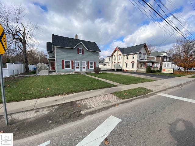 view of front of property with a front yard