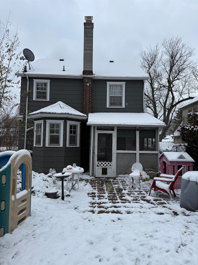 view of snow covered property