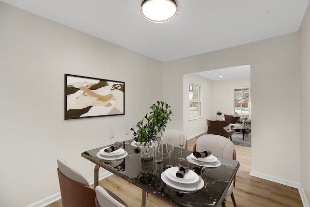 dining area featuring hardwood / wood-style floors