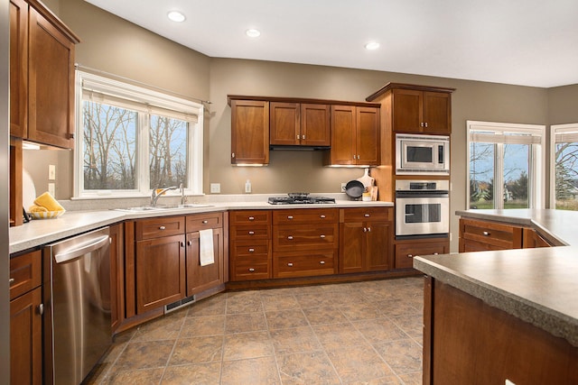 kitchen with sink and appliances with stainless steel finishes