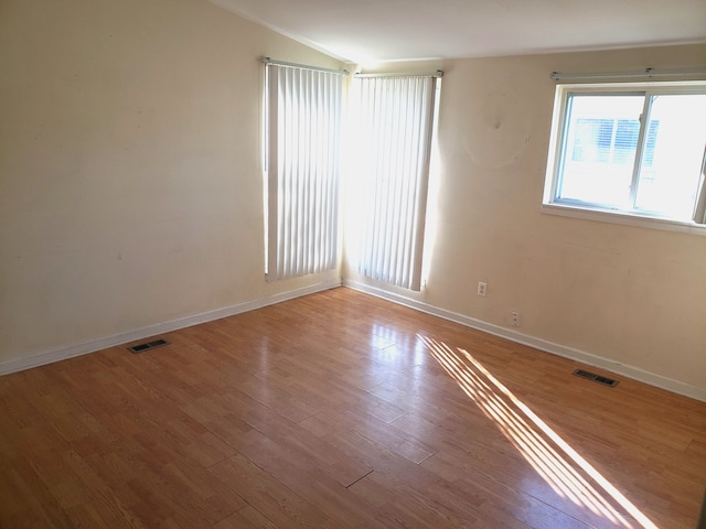 empty room featuring light hardwood / wood-style floors