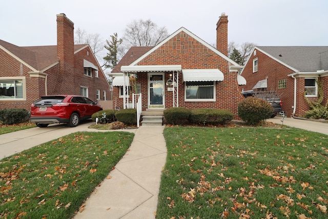 view of front of home with a front yard