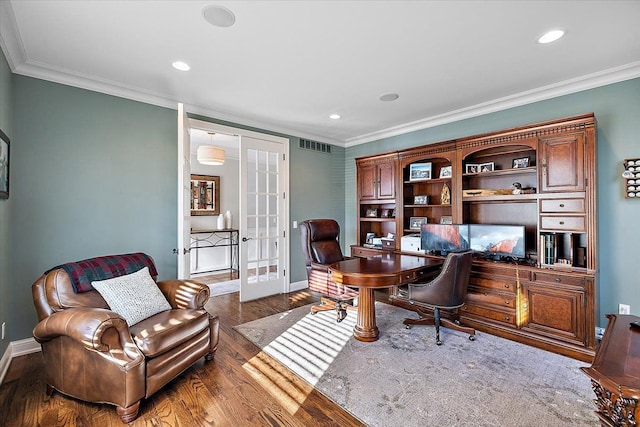 office space with french doors, crown molding, and dark wood-type flooring