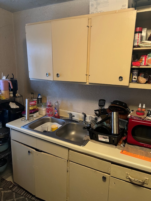 kitchen with white dishwasher and sink