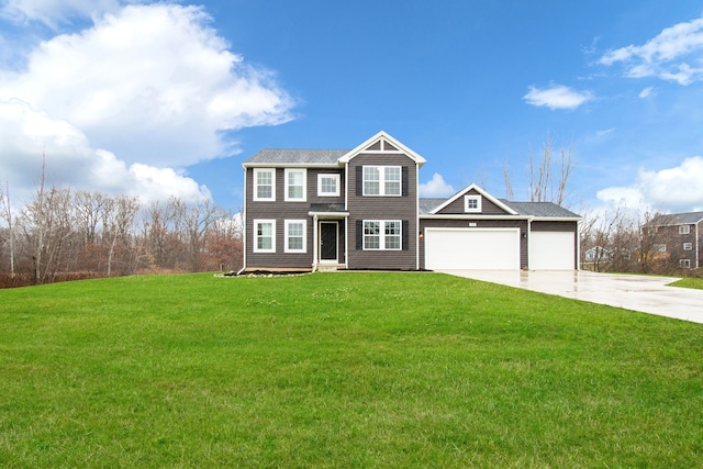 view of front facade featuring a front lawn and a garage