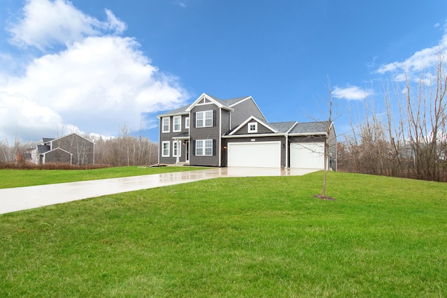 view of front facade with a front yard and a garage