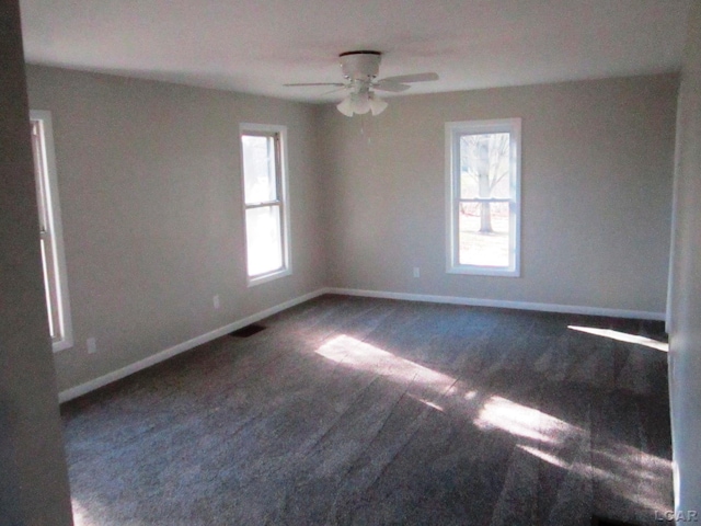 16378 Cadmus Rd, Hudson, MI 49247 - empty room with healthy amount of natural light, baseboards, and a ceiling fan