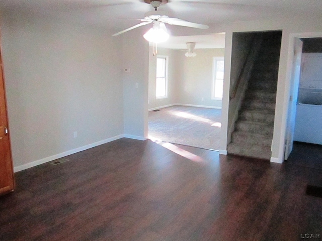 16378 Cadmus Rd, Hudson, MI 49247 - empty room with ceiling fan, wood finished floors, baseboards, and stairs