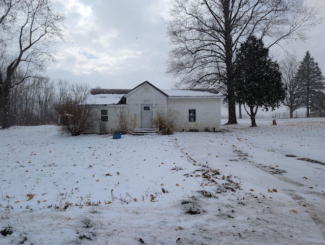 view of snow covered property