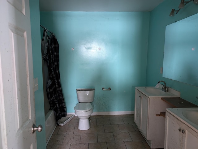 full bathroom featuring tile patterned floors, vanity, toilet, and shower / tub combo