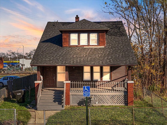 bungalow-style home with a porch