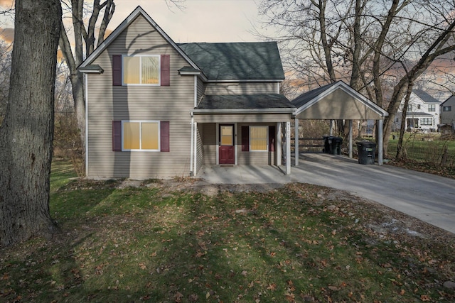 exterior space featuring covered porch and a yard