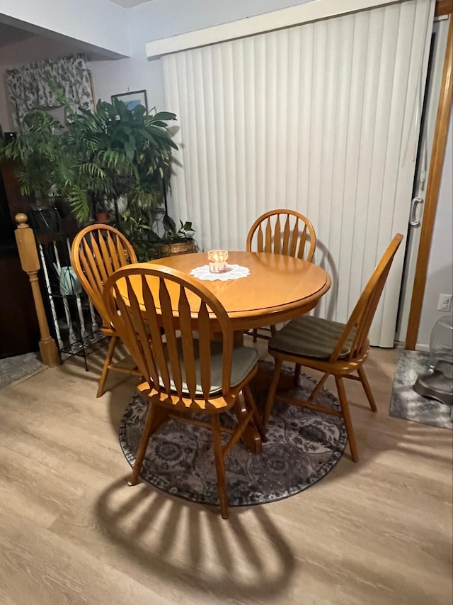 dining area featuring hardwood / wood-style flooring