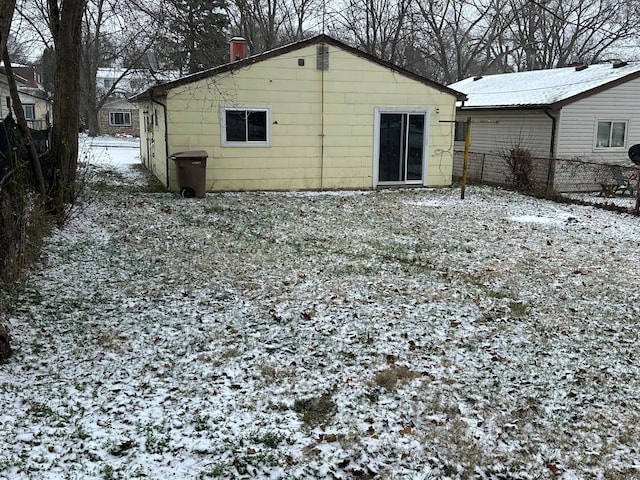 view of snow covered property