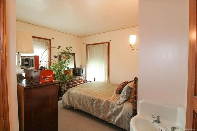 bedroom featuring carpet flooring