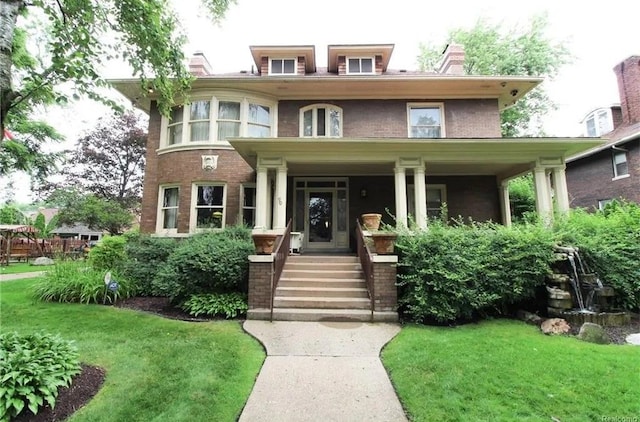 90 Edison St, Detroit, MI 48202 - view of front of house with a chimney, a front yard, and a porch