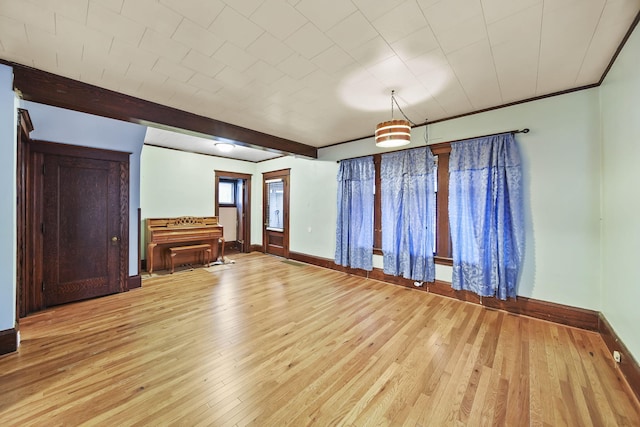 unfurnished room with light wood-type flooring