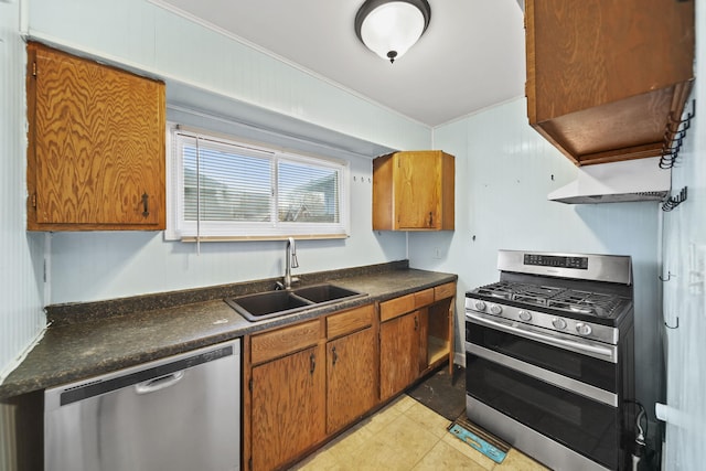 kitchen featuring light tile patterned floors, sink, and appliances with stainless steel finishes