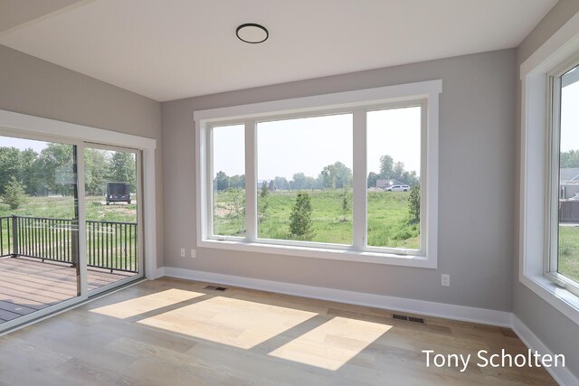 5184 Blendon Meadow Cir Unit 47, Hudsonville, MI 49426 - empty room with wood finished floors and baseboards