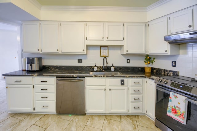 kitchen with dark stone countertops, white cabinetry, sink, and appliances with stainless steel finishes