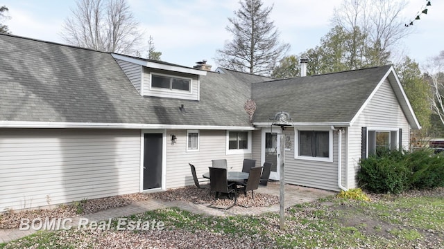 rear view of property with a patio area