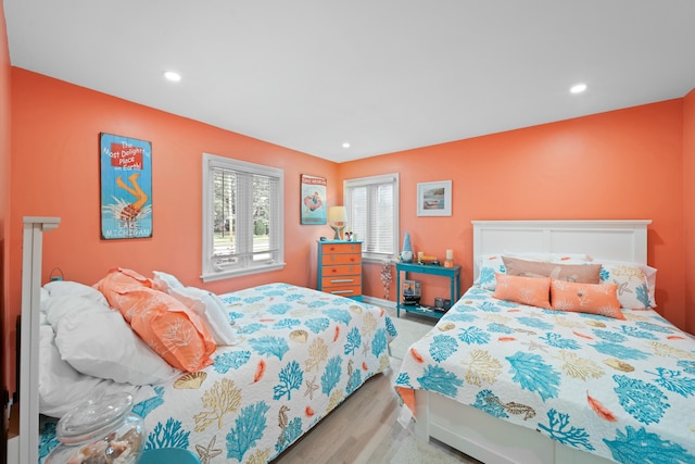 bedroom with light wood-type flooring