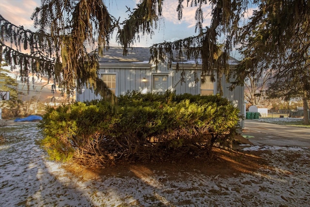 view of property exterior at dusk