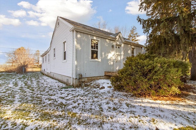 view of snow covered property