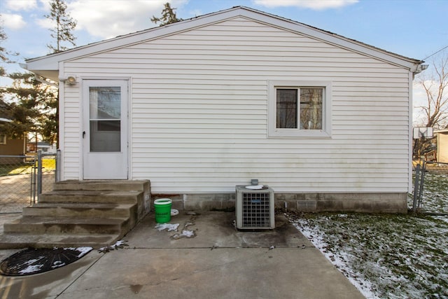 back of property with cooling unit