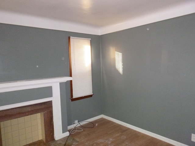 unfurnished living room featuring hardwood / wood-style floors