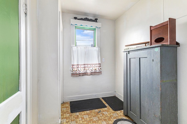 bathroom featuring baseboards