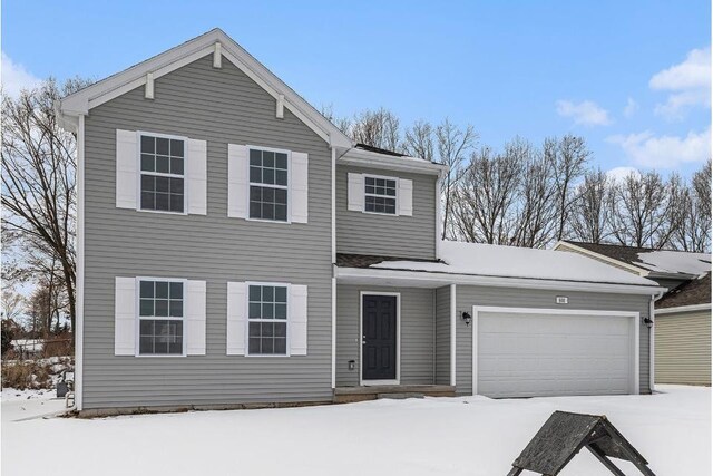 front of property featuring a garage