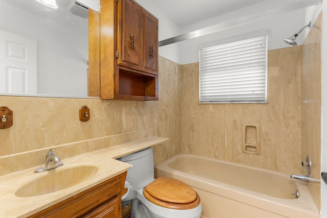 full bathroom with tasteful backsplash, vanity, bathtub / shower combination, and toilet