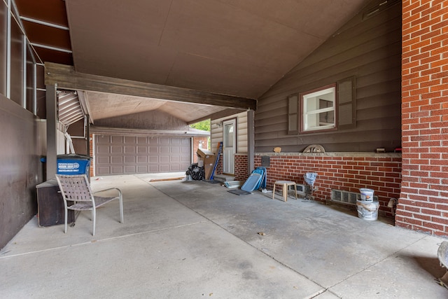 view of patio / terrace with a garage