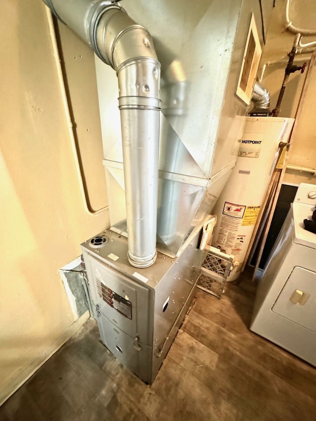 utilities with water heater and washer / dryer