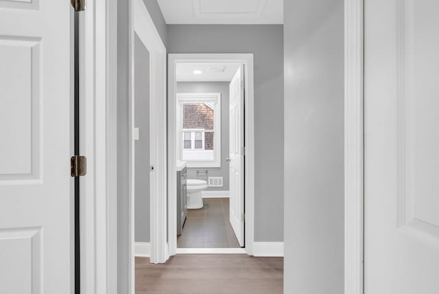 hallway featuring light hardwood / wood-style floors