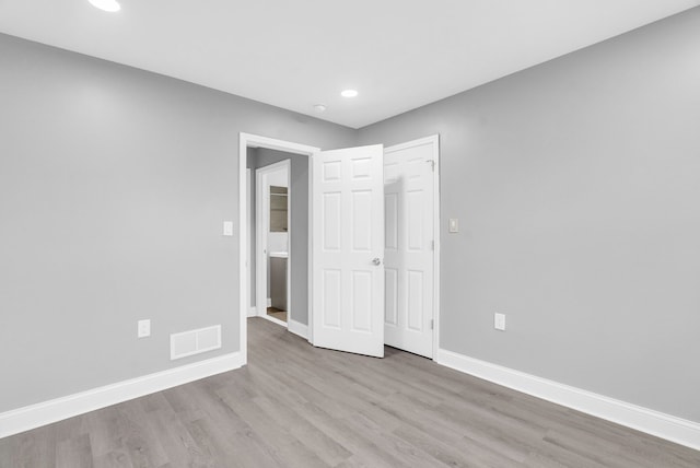 unfurnished bedroom featuring light hardwood / wood-style flooring