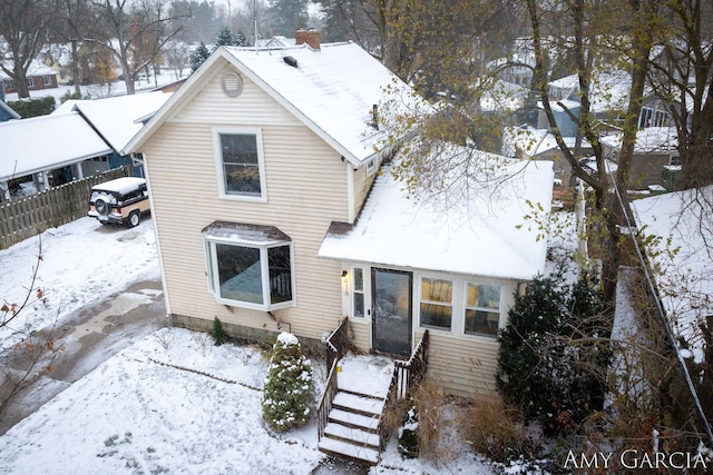 view of snow covered property