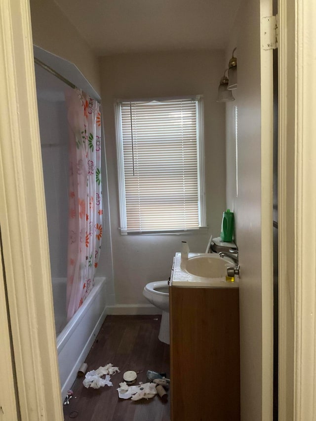 full bathroom with vanity, shower / bath combination with curtain, toilet, and wood-type flooring