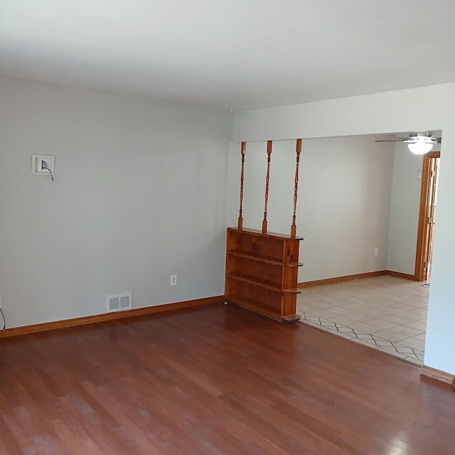 spare room featuring light wood-type flooring