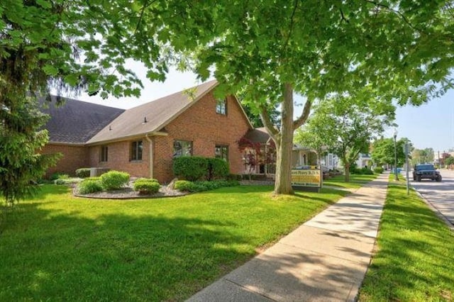 exterior space with a lawn