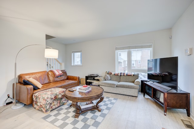 living room with light wood-type flooring